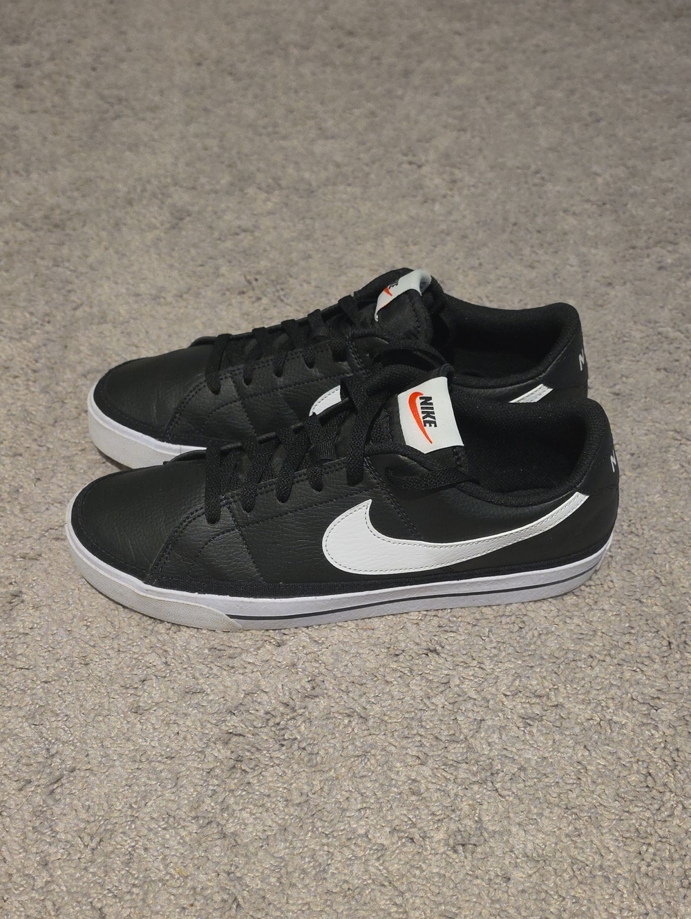 Nike Black Sneakers with White Swoosh and White Midsole